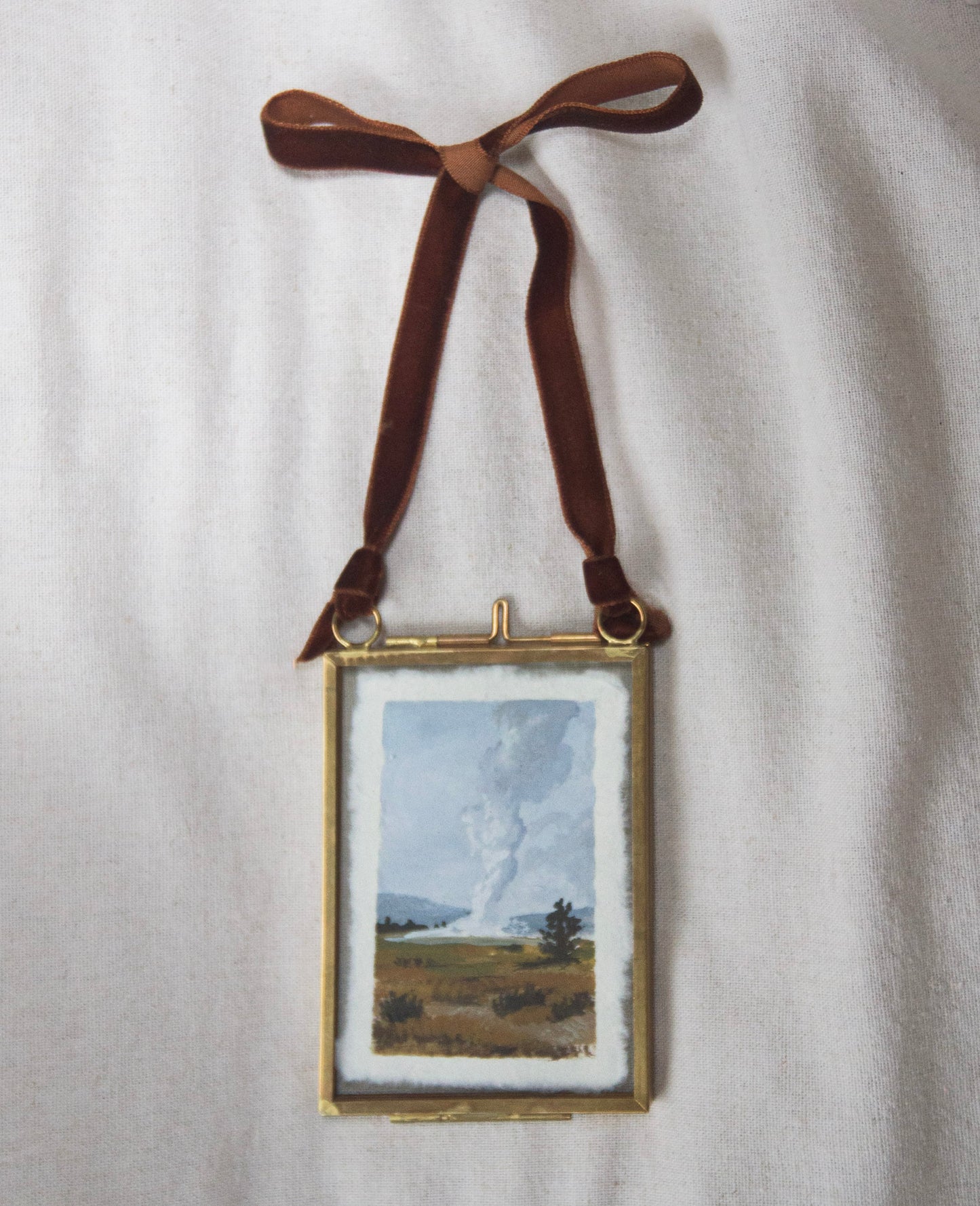 Framed Old Faithful Geyser miniature painting from 'The Journey' National Park collection with brown ribbon