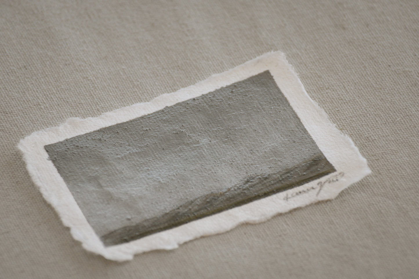 Side profile of Great Sand Dunes and Sangre de Cristo mountains painting on deckled edge 100% cotton rag paper with embedded sand from the park into the painting 