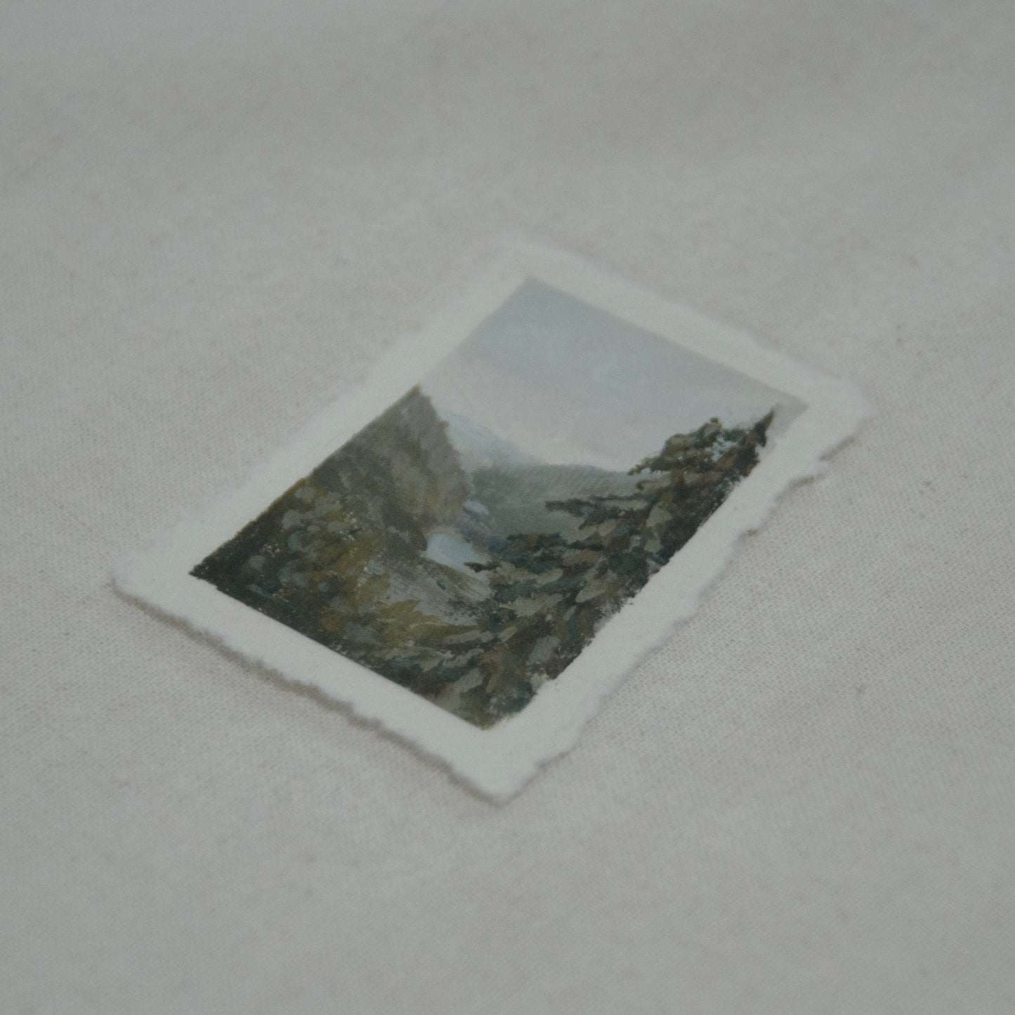 Side profile of Grinnell Lake Glacier National Park painting on deckled edge 100% cotton rag paper