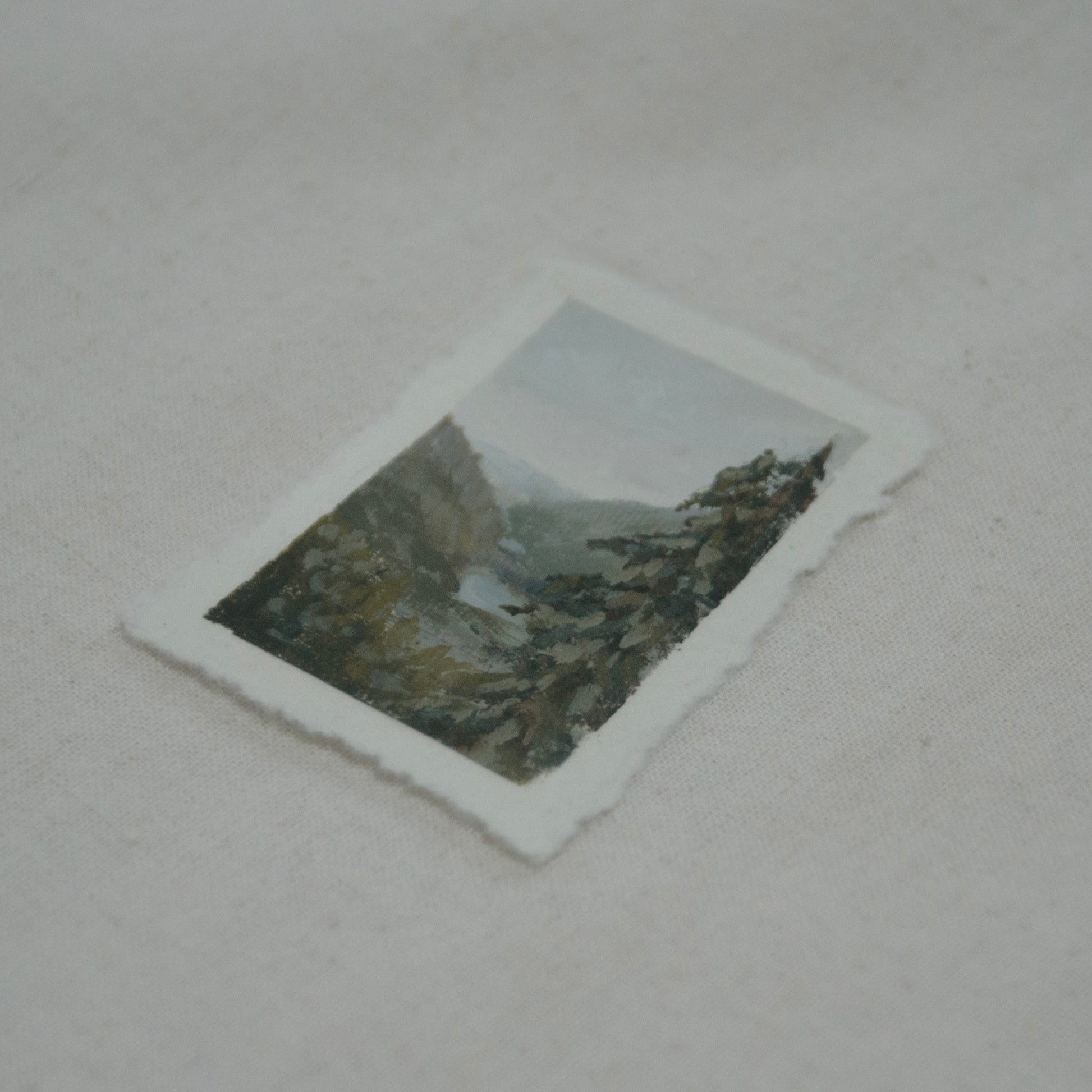Side profile of Grinnell Lake Glacier National Park painting on deckled edge 100% cotton rag paper