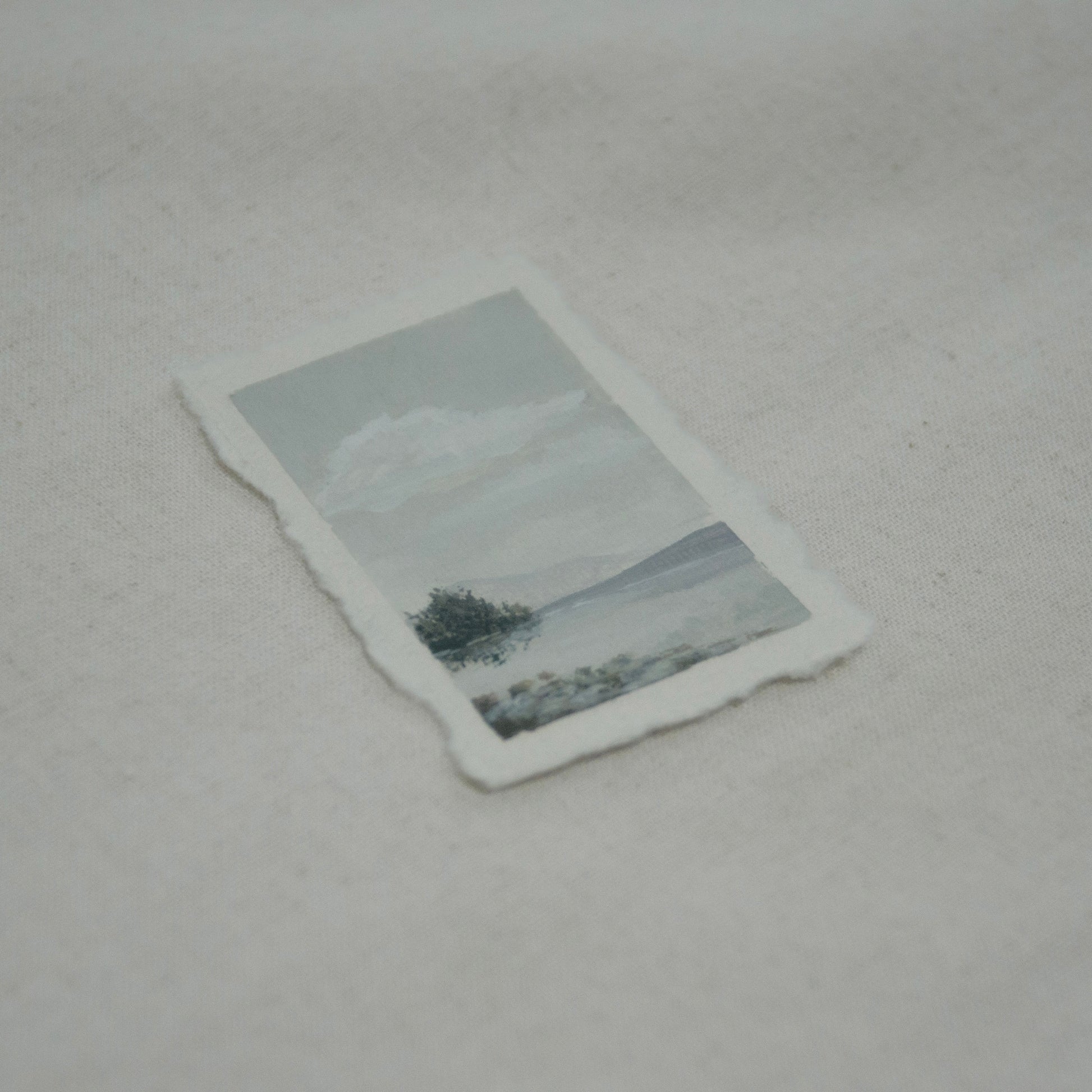 Side profile of Lake McDonald from Glacier National Park painting on deckled edge 100% cotton rag paper