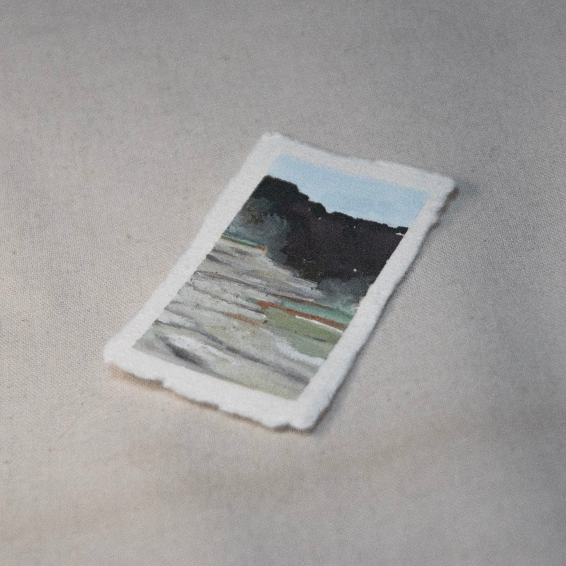 Handheld original miniature painting of Mammoth Hot Spring in Yellowstone National Park