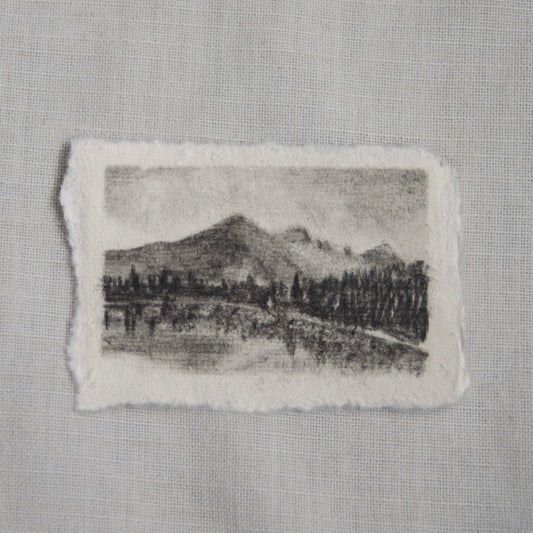 a miniature charcoal sketch of bear lake in Rocky Mountain National Park by artist Laura Van Moorleghem with 100% of the proceeds donated to NPCA