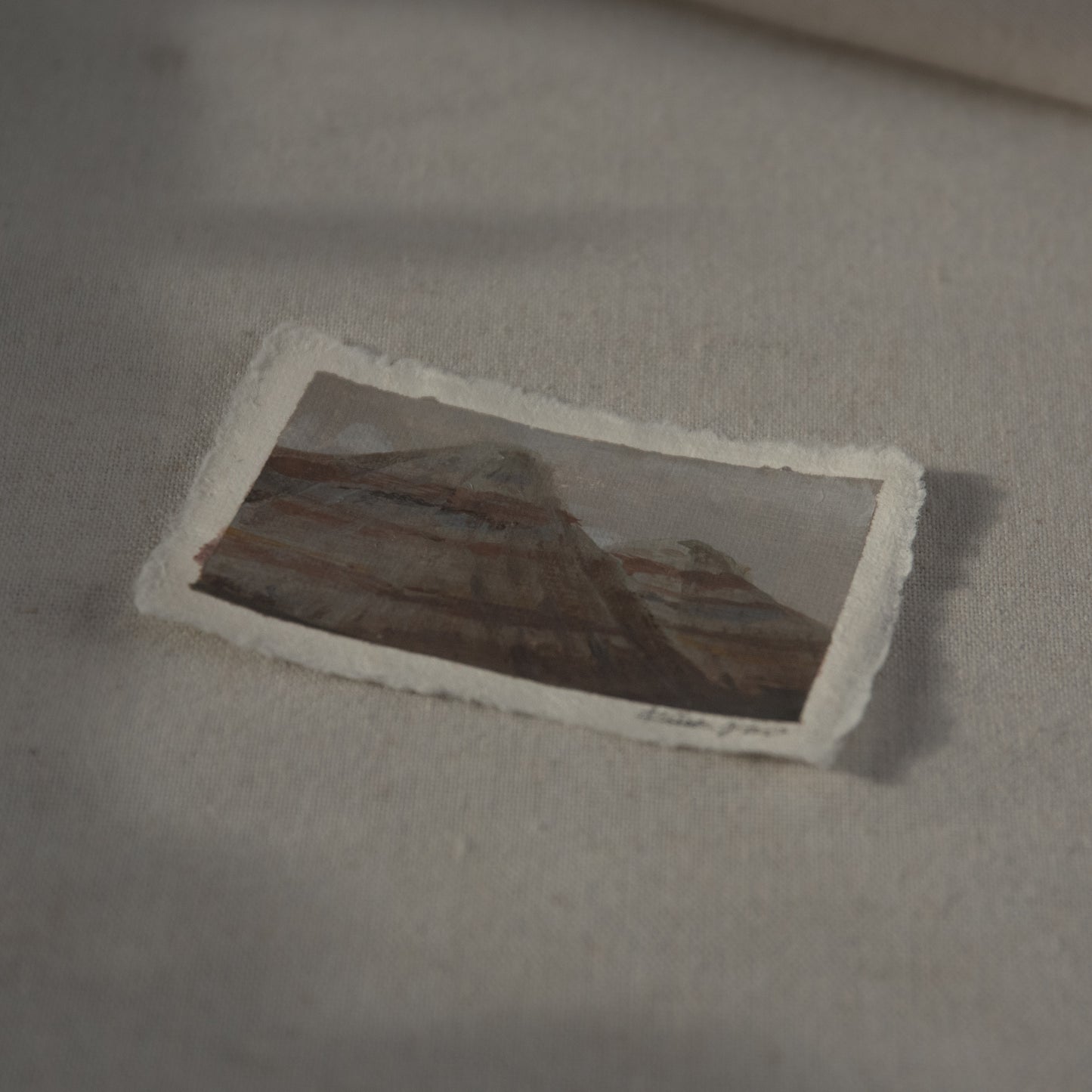 Side profile of Petrified Forest Blue Mesa mountain painting on deckled edge 100% cotton rag paper
