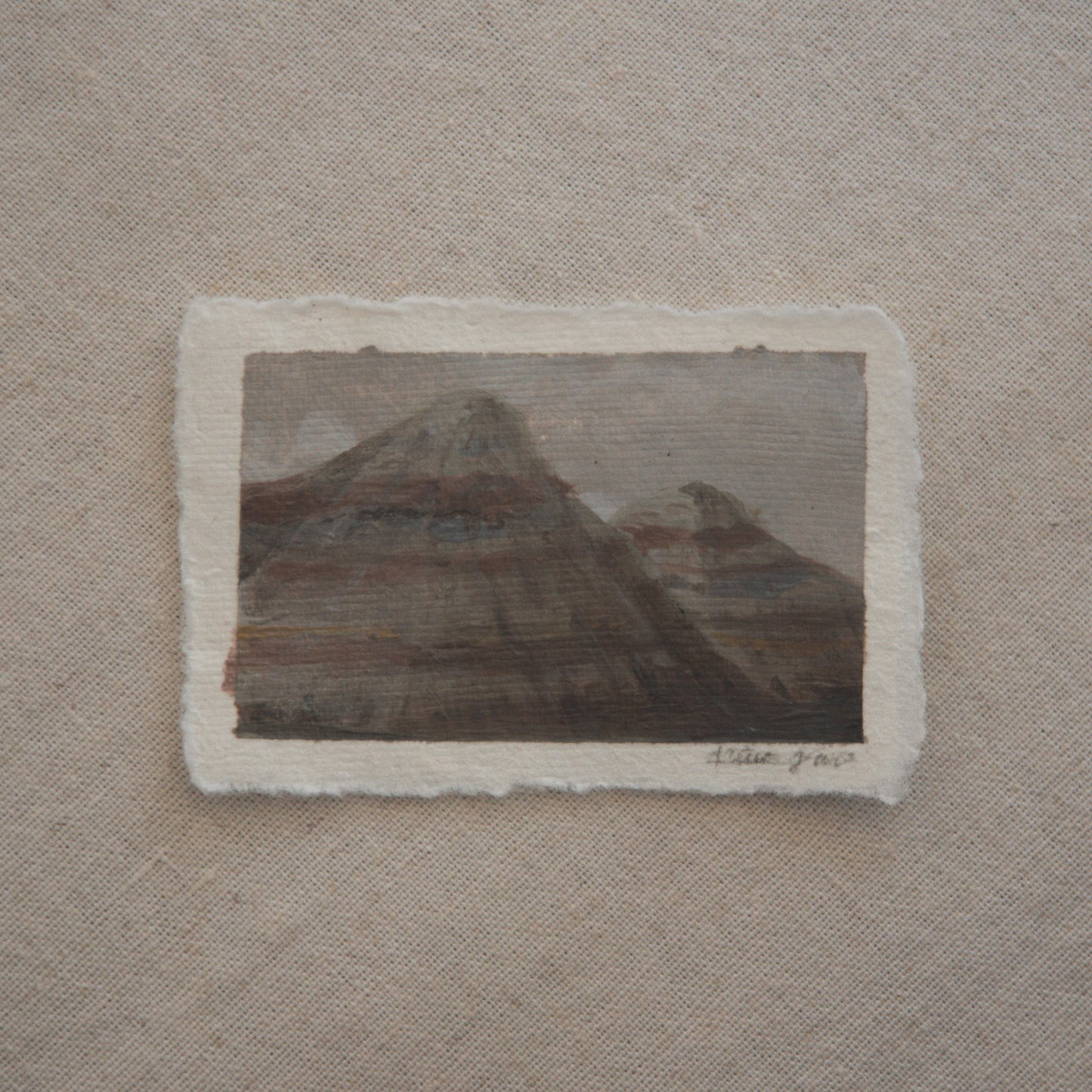 Blue Mesa mountains in a miniature acrylic painting from Petrified Forest National Park by Laura Van Moorleghem