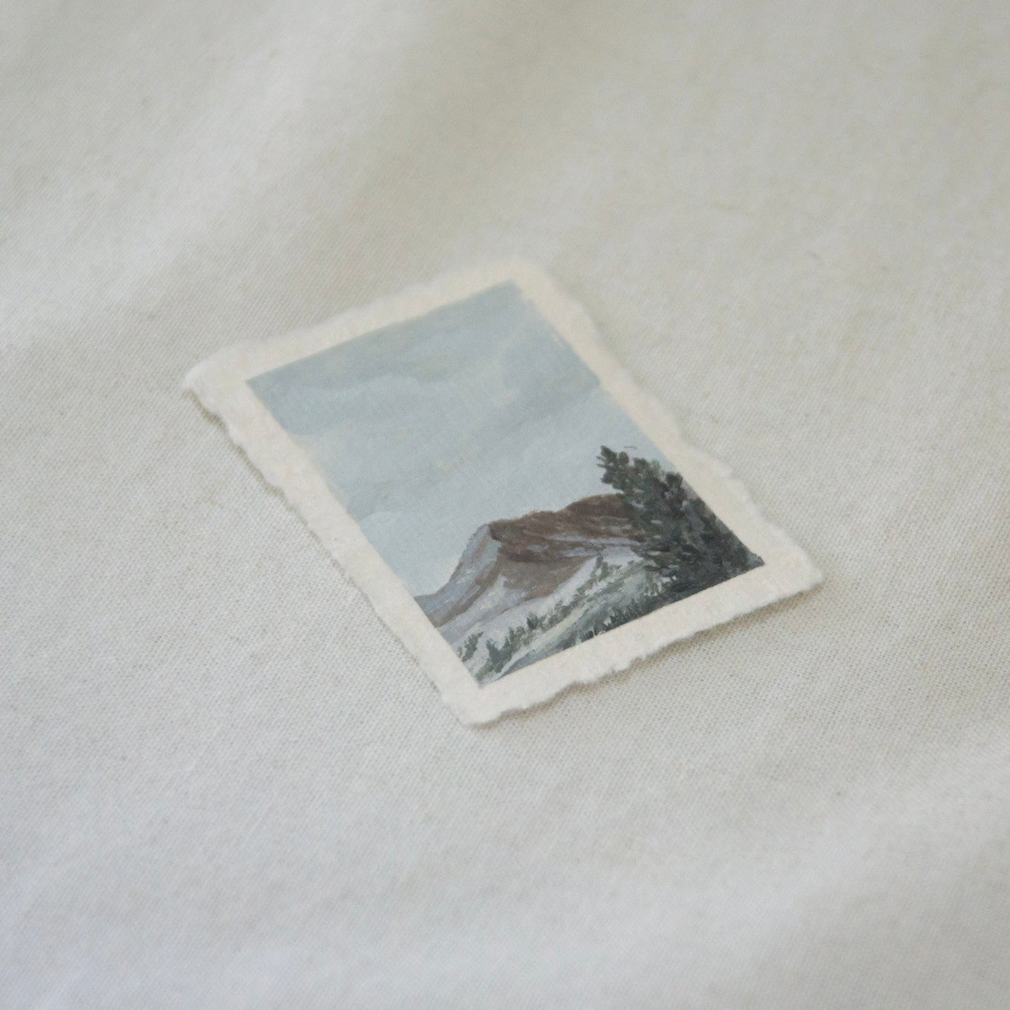 Side profile of Brokeoff Mountain in Lassen Volcanic National Park painting on deckled edge 100% cotton rag paper