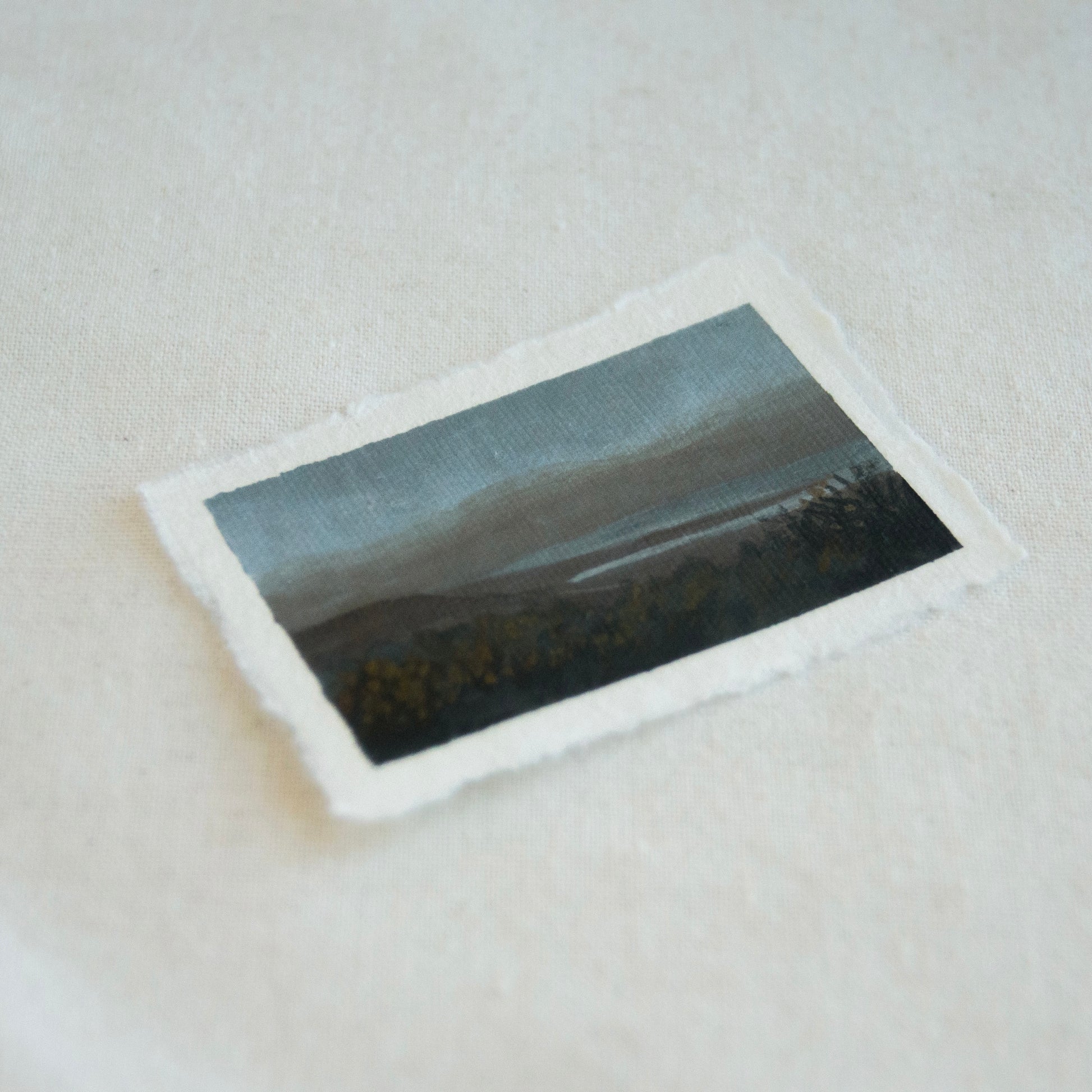 Side profile of lake and mountain overlook at Point Reyes National Seashore painting on deckled edge 100% cotton rag paper