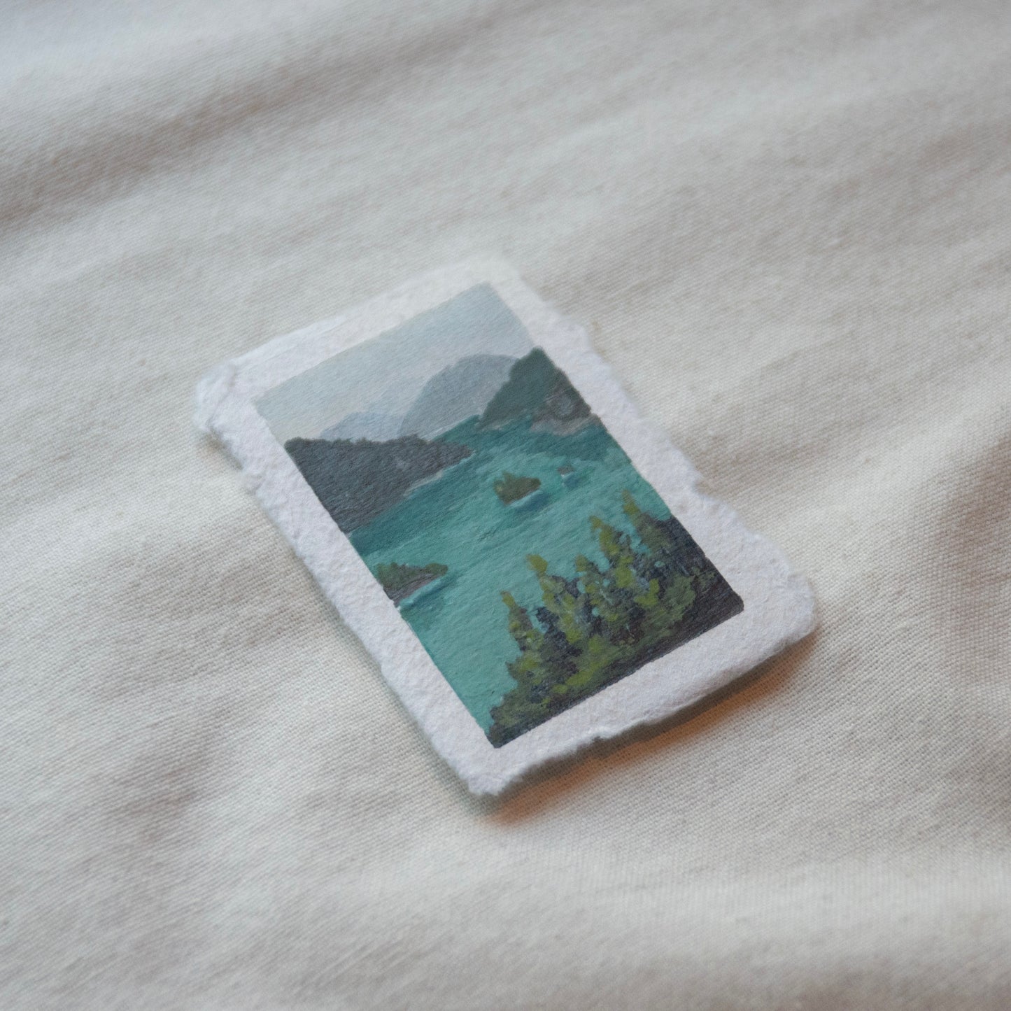 Side profile of diablo lake in North cascades national park painting on deckled edge 100% cotton rag paper