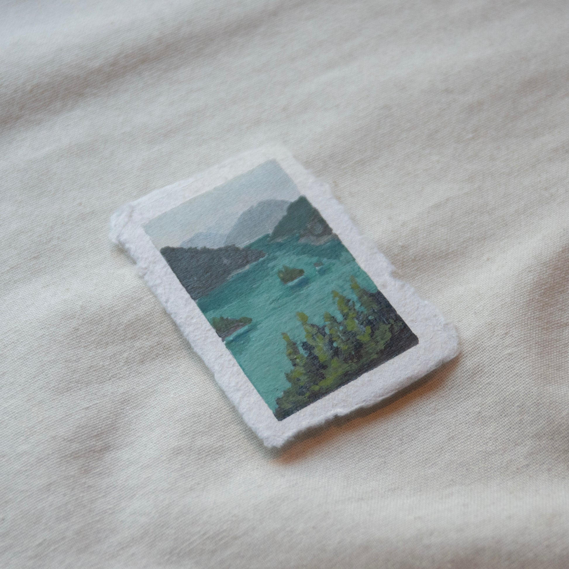 Side profile of diablo lake in North cascades national park painting on deckled edge 100% cotton rag paper