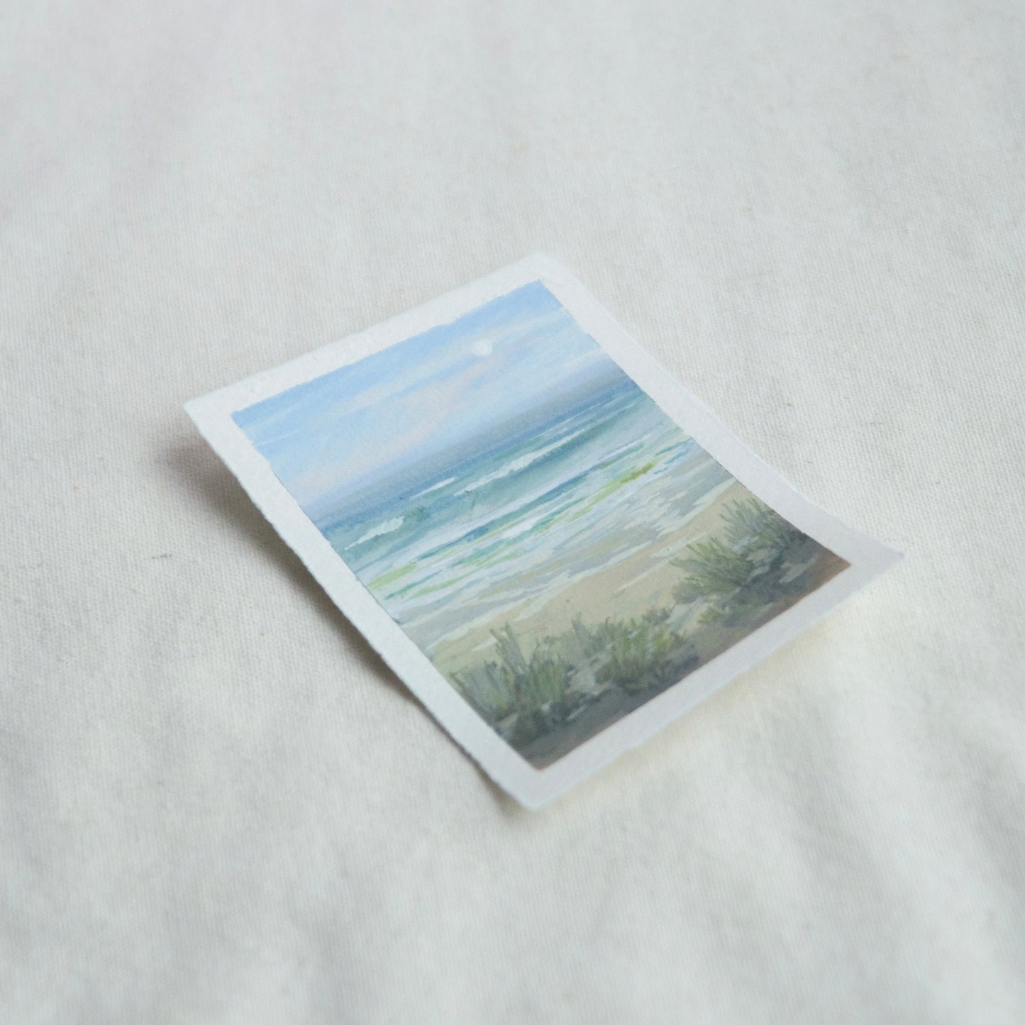Side profile of gulf islands seashore painting on deckled edge 100% cotton rag paper