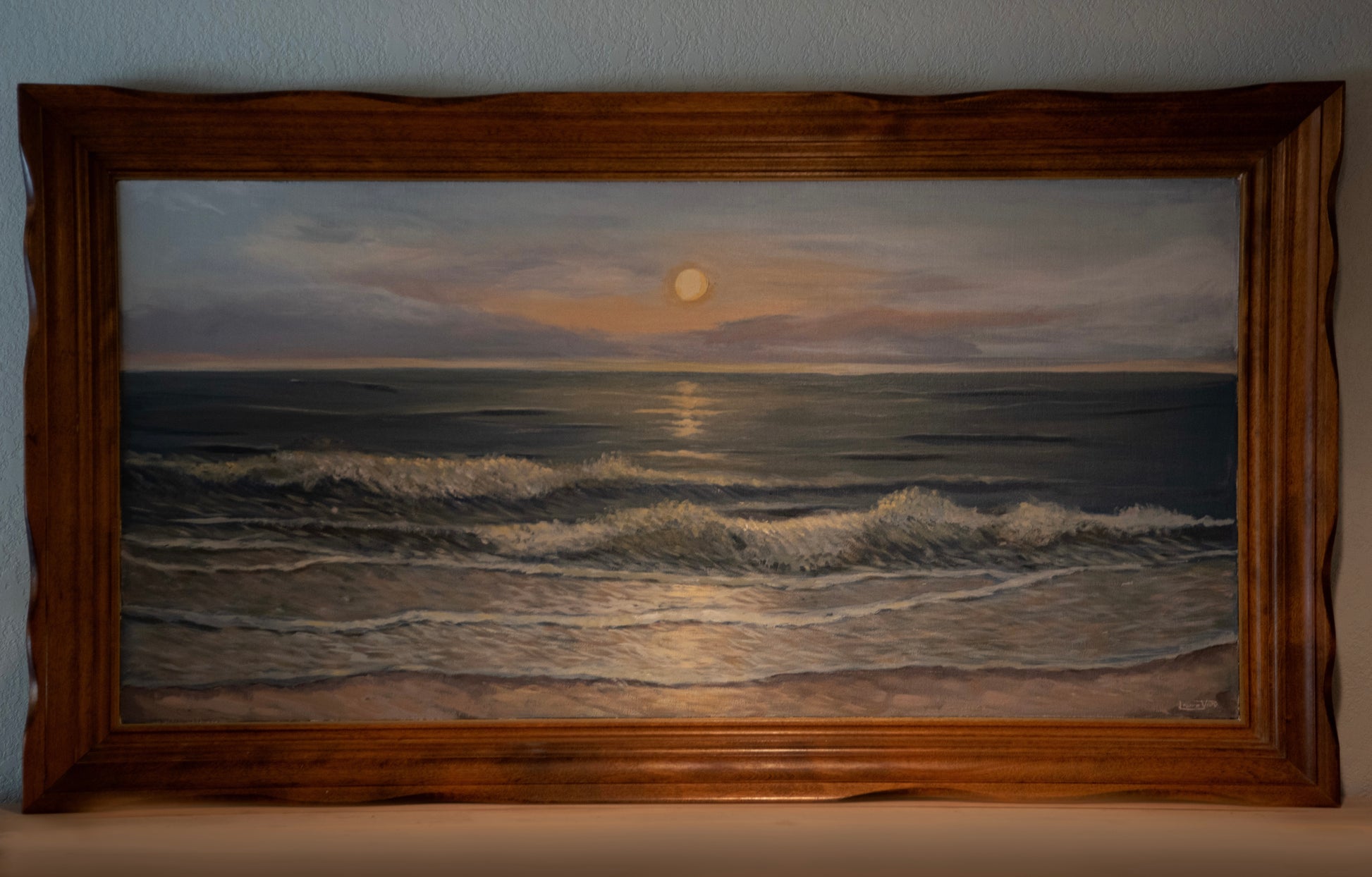 large acrylic painting done of gulf shores beach at sunset in a large vintage wood frame by artist Laura van Moorleghem