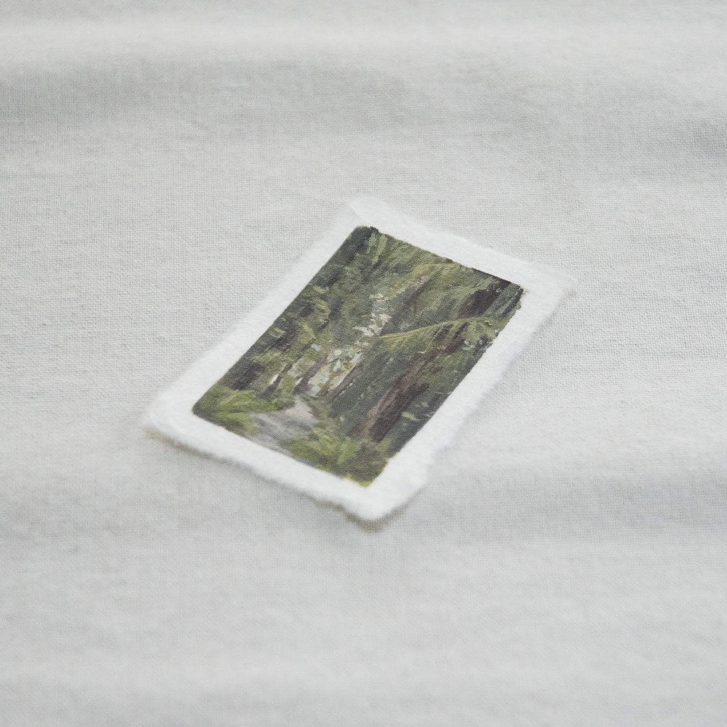 Side profile of Hoh rainforest trail painting on deckled edge 100% cotton rag paper