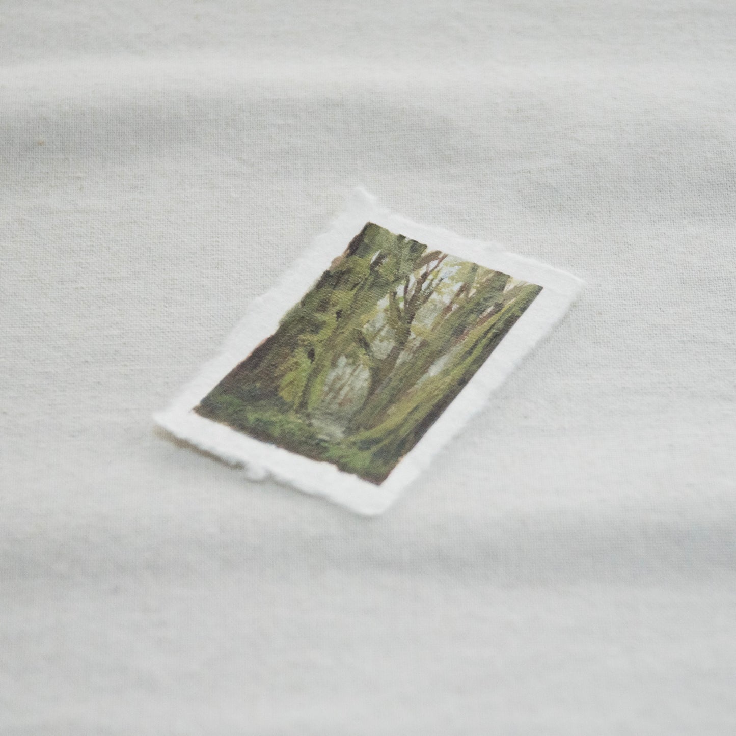 Side profile of hoh rainforest in olympic national park painting on deckled edge 100% cotton rag paper