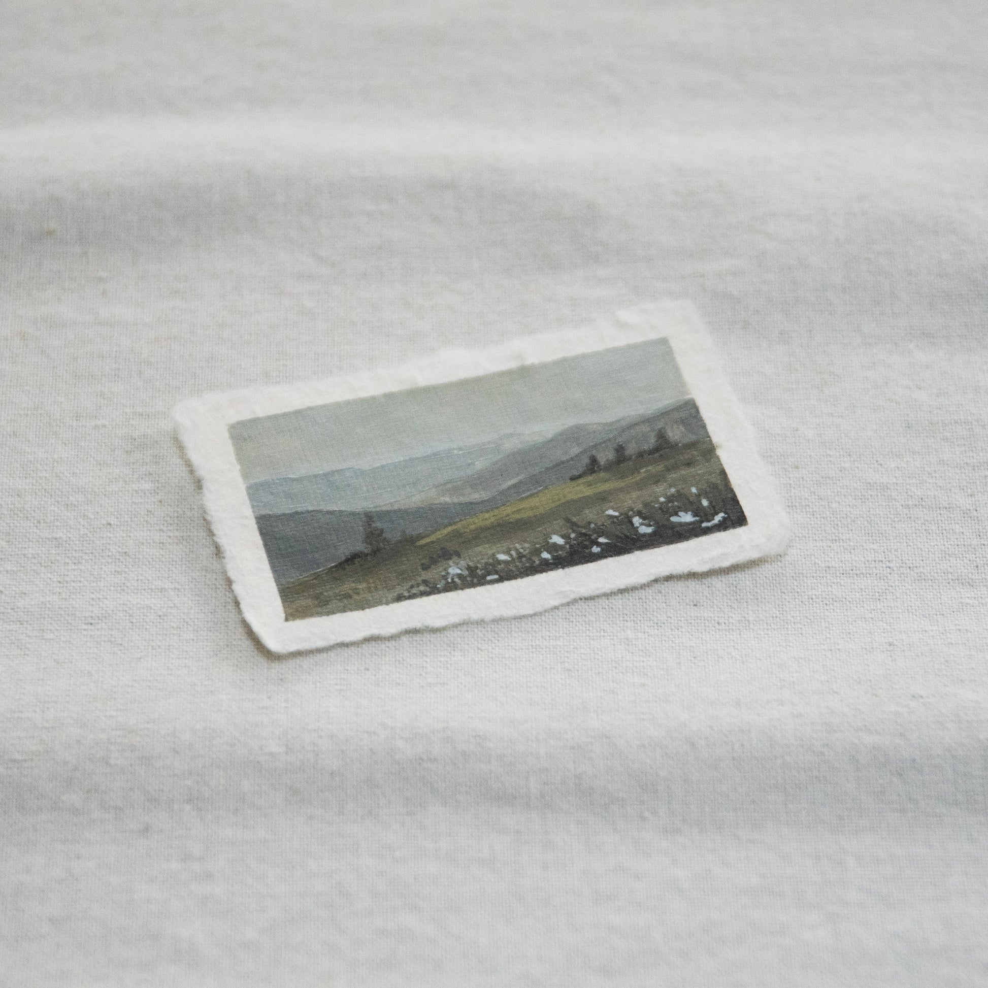 Side profile of an overlook in hurricane ridge at Olympic National Park painting on deckled edge 100% cotton rag paper