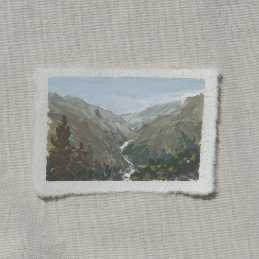 A miniature gouache painting on cotton rag paper with a deckled edge, depicting the mountainous landscape of Junction view overlook in Kings Canyon National Park, by Laura van Moorleghem