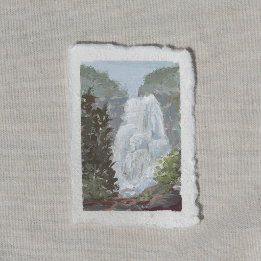 A miniature gouache painting of Grizzly Falls waterfall from Kings Canyon National Park surrounded by greenery on 100% cotton rag by Laura Van Moorleghem