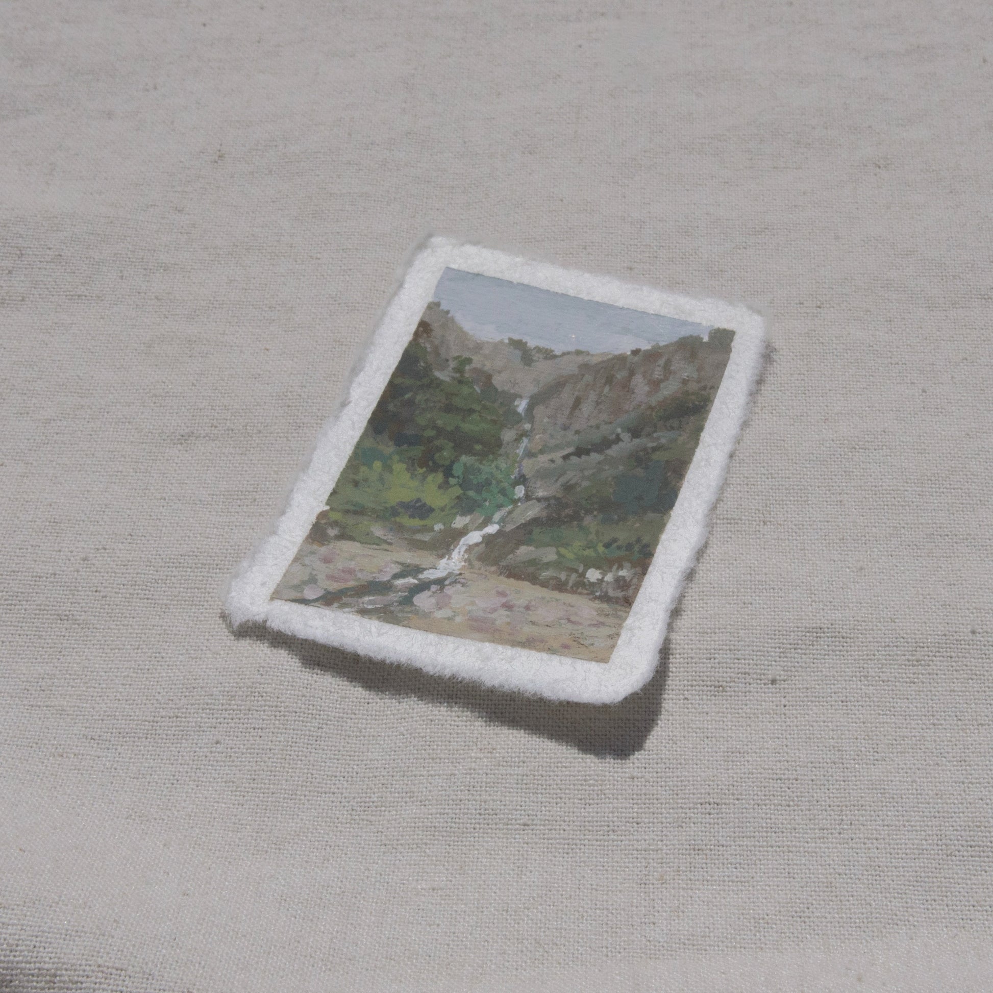 Side profile of a waterfall and valley in Kings Canyon National Park painting on deckled edge 100% cotton rag paper
