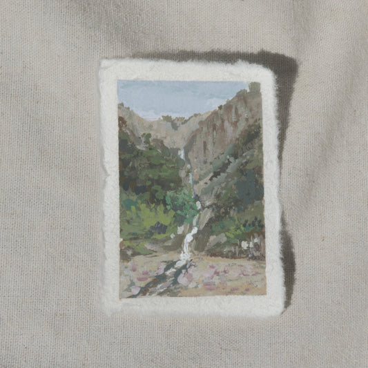 A miniature painting depicting a waterfall and a valley in Kings Canyon National Park, executed in gouache on cotton rag paper with a deckled edge.