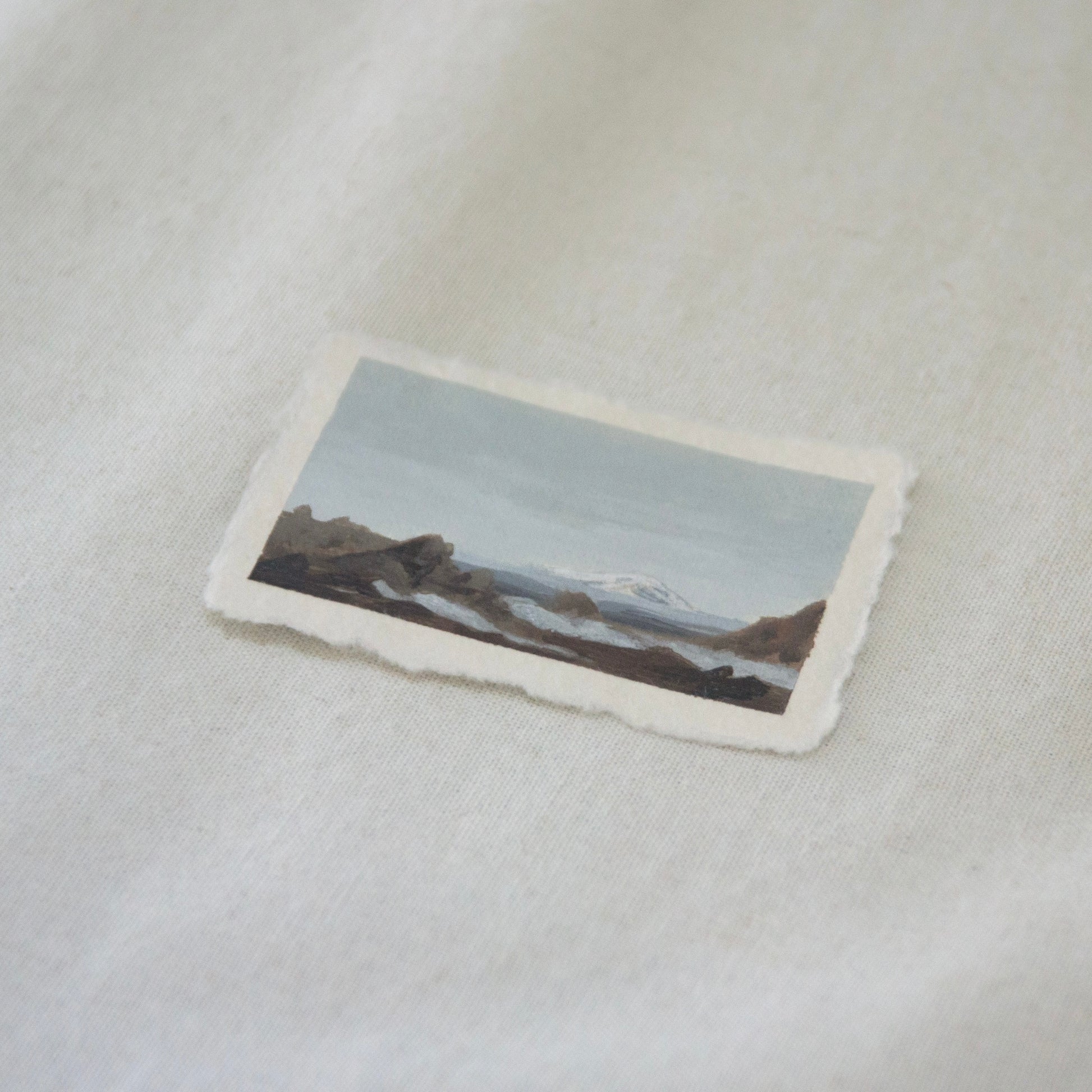 Side profile of Mount Shasta from peak of Lassen Volcano painting on deckled edge 100% cotton rag paper from Lassen Volcanic National Park
