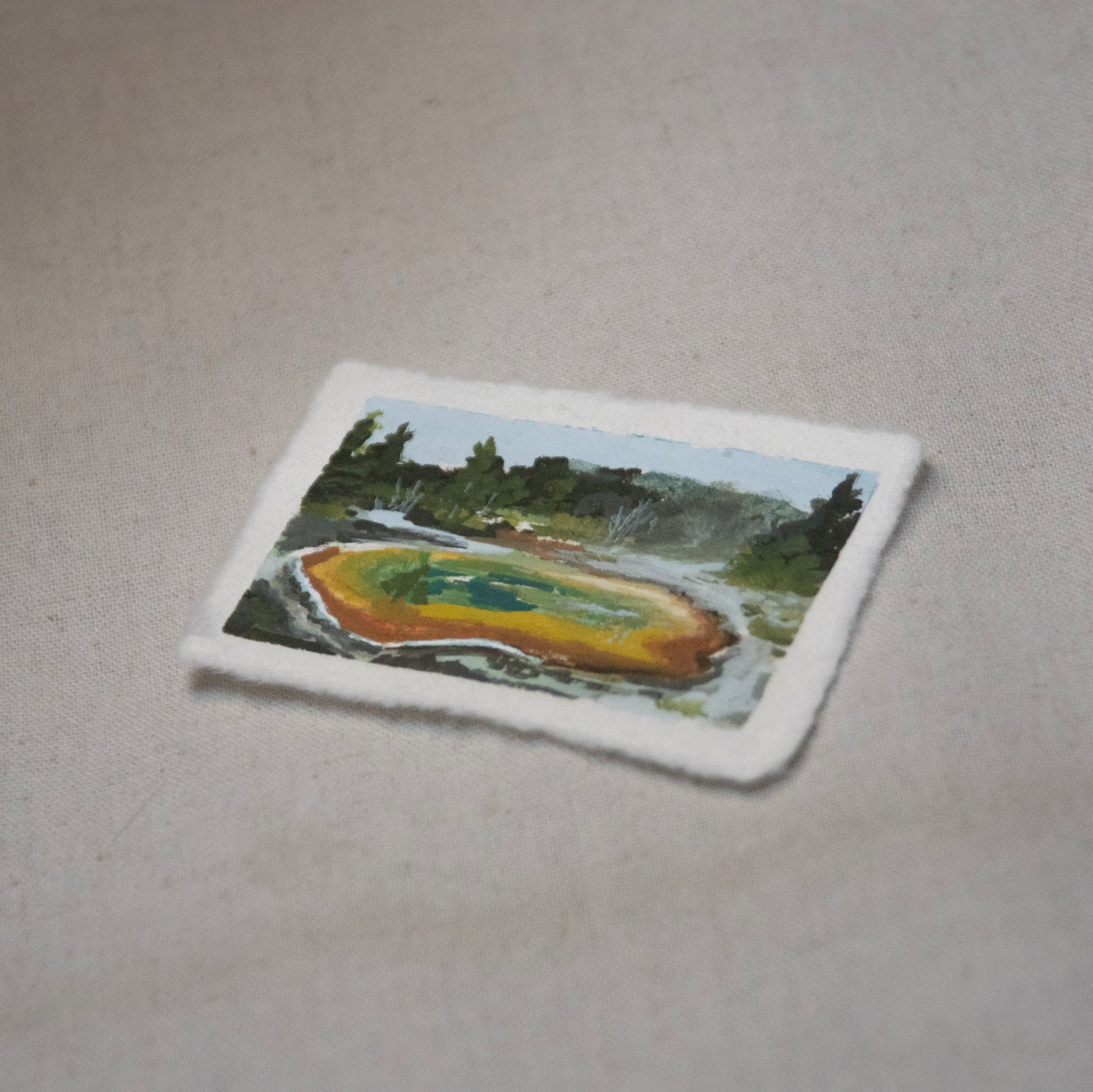 Side profile of Morning Glory Pool Yellowstone painting on deckled edge 100% cotton rag paper