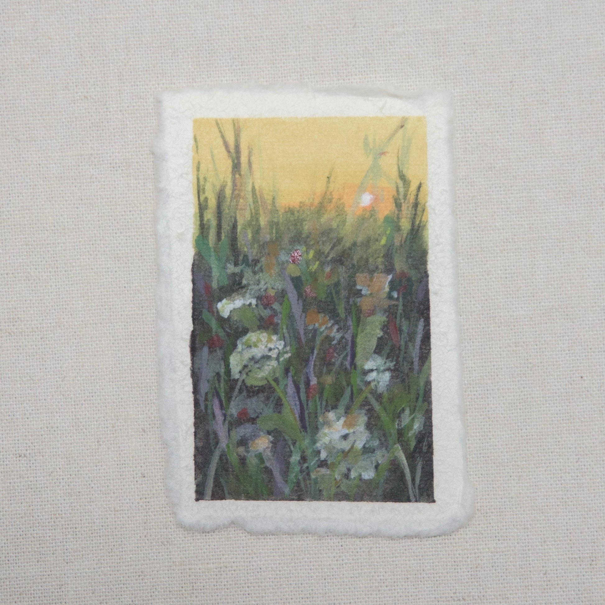 A small artwork titled 'In Bloom' featuring a floral scene with gouache and acrylic on cotton rag paper with a deckled edge, for a Mother's Day gift  by artist Laura van Moorleghem