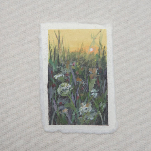 A small artwork titled 'In Bloom' featuring a floral scene with gouache and acrylic on cotton rag paper with a deckled edge, for a Mother's Day gift  by artist Laura van Moorleghem