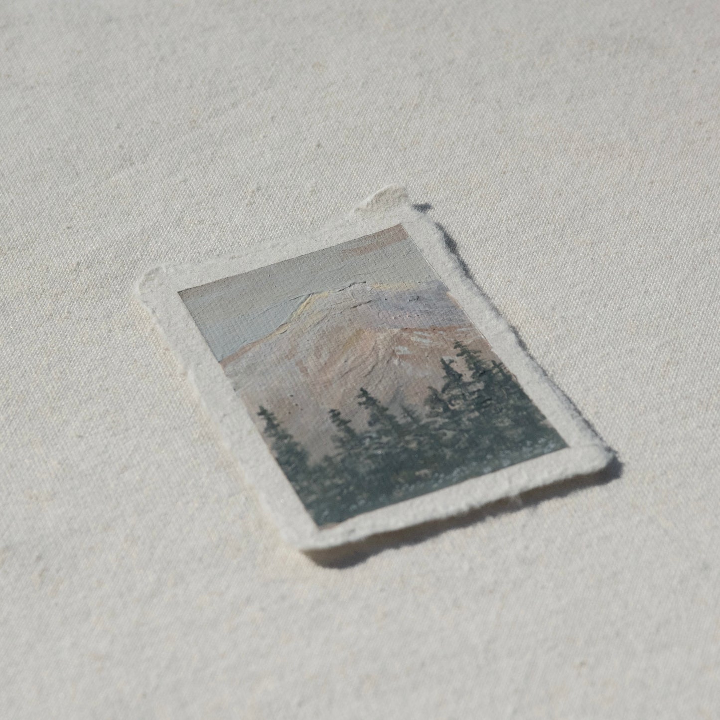 Side profile of mount rainier at sunrise painting on deckled edge 100% cotton rag paper