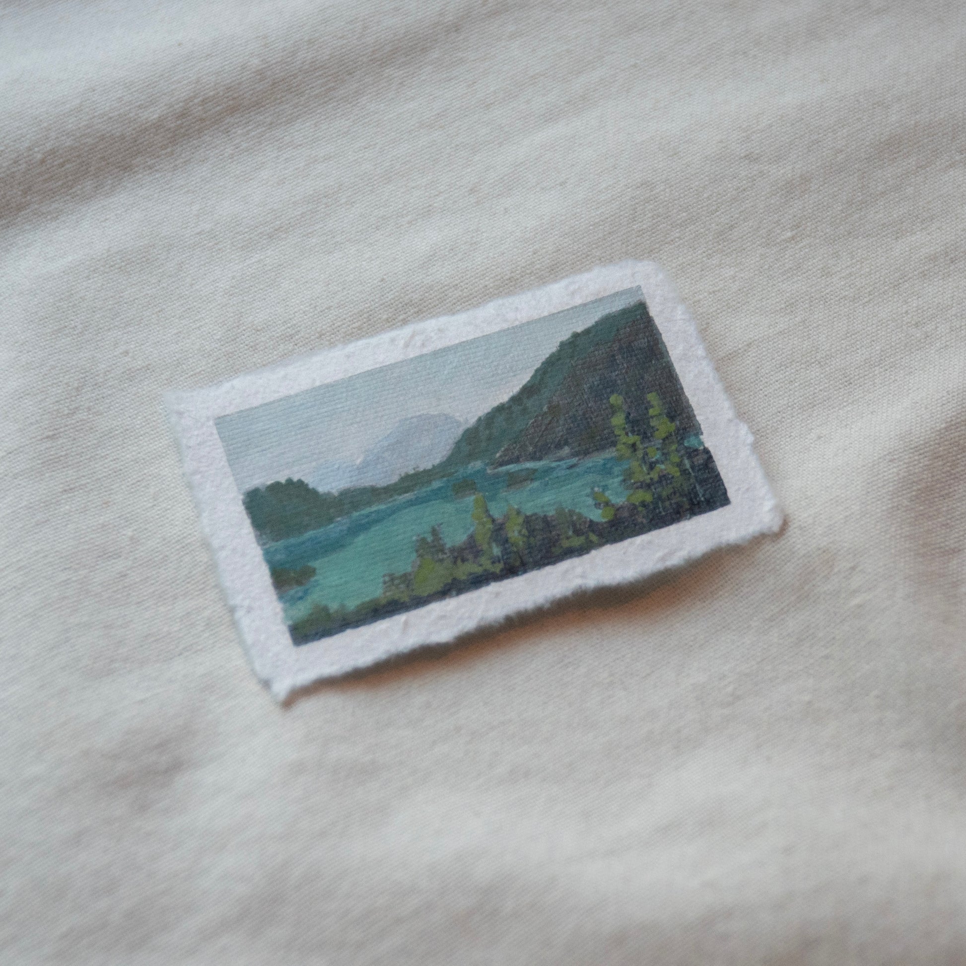 Side profile of diablo lake overlook in north cascades national park painting on deckled edge 100% cotton rag paper