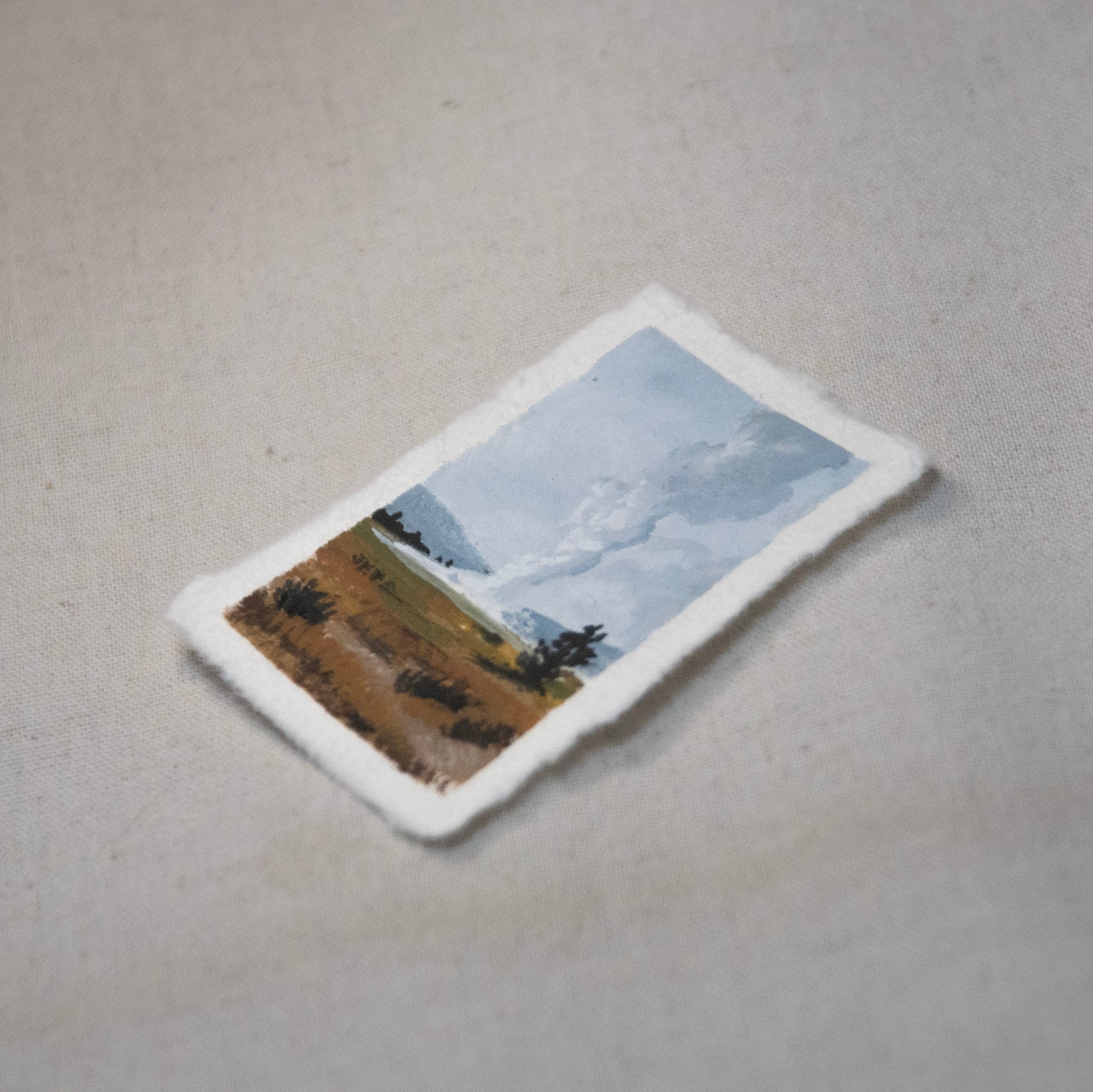 Side profile of Old faithful Geyser  Yellowstone painting on deckled edge 100% cotton rag paper.
