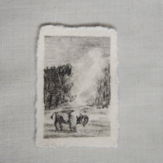 A charcoal sketch of Old Faithful in Yellowstone National Park with bison standing in front of old faithful geyser on deckled edge paper by Laura Van Moorleghem