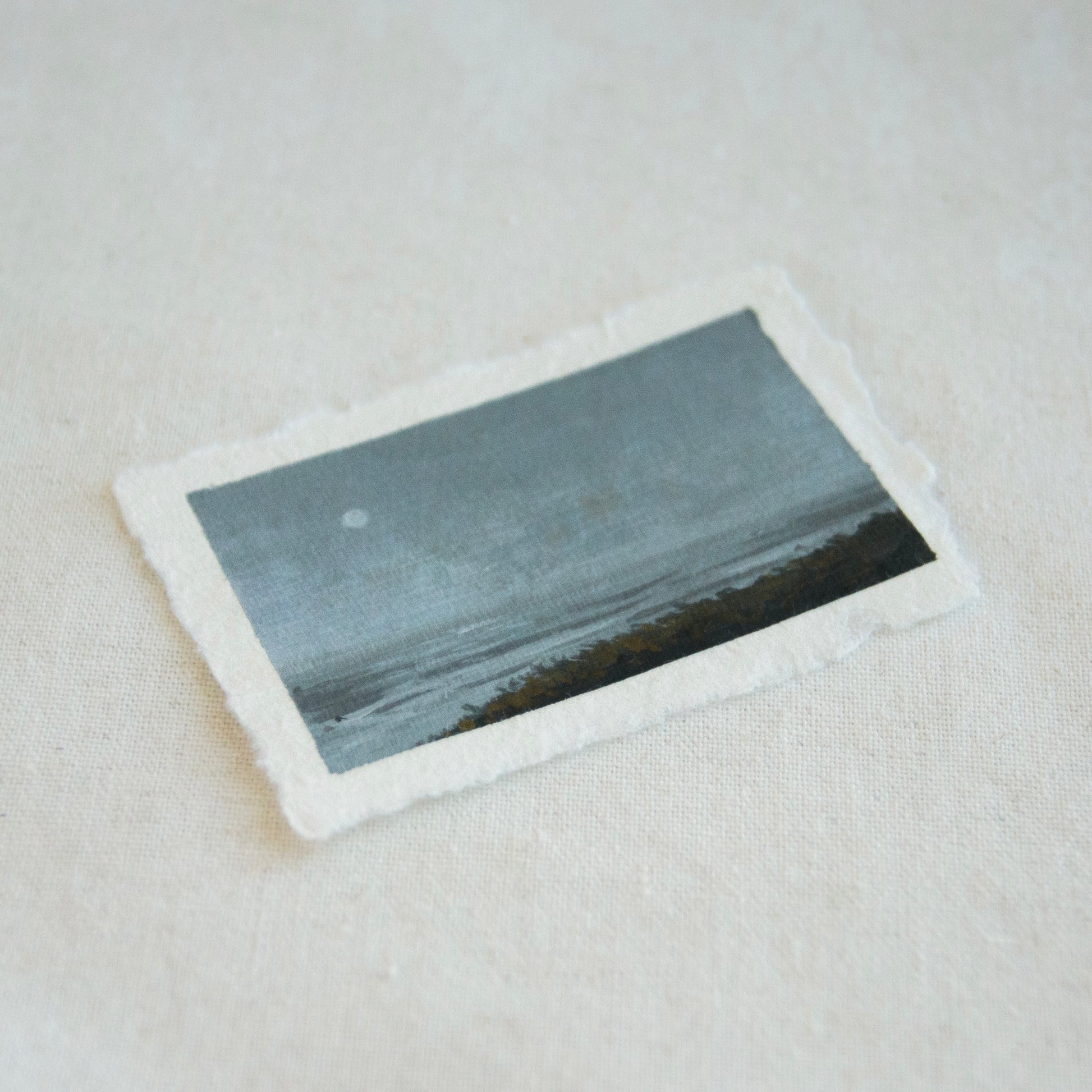 Side profile of ocean at Point Reyes National Seashore painting on deckled edge 100% cotton rag paper
