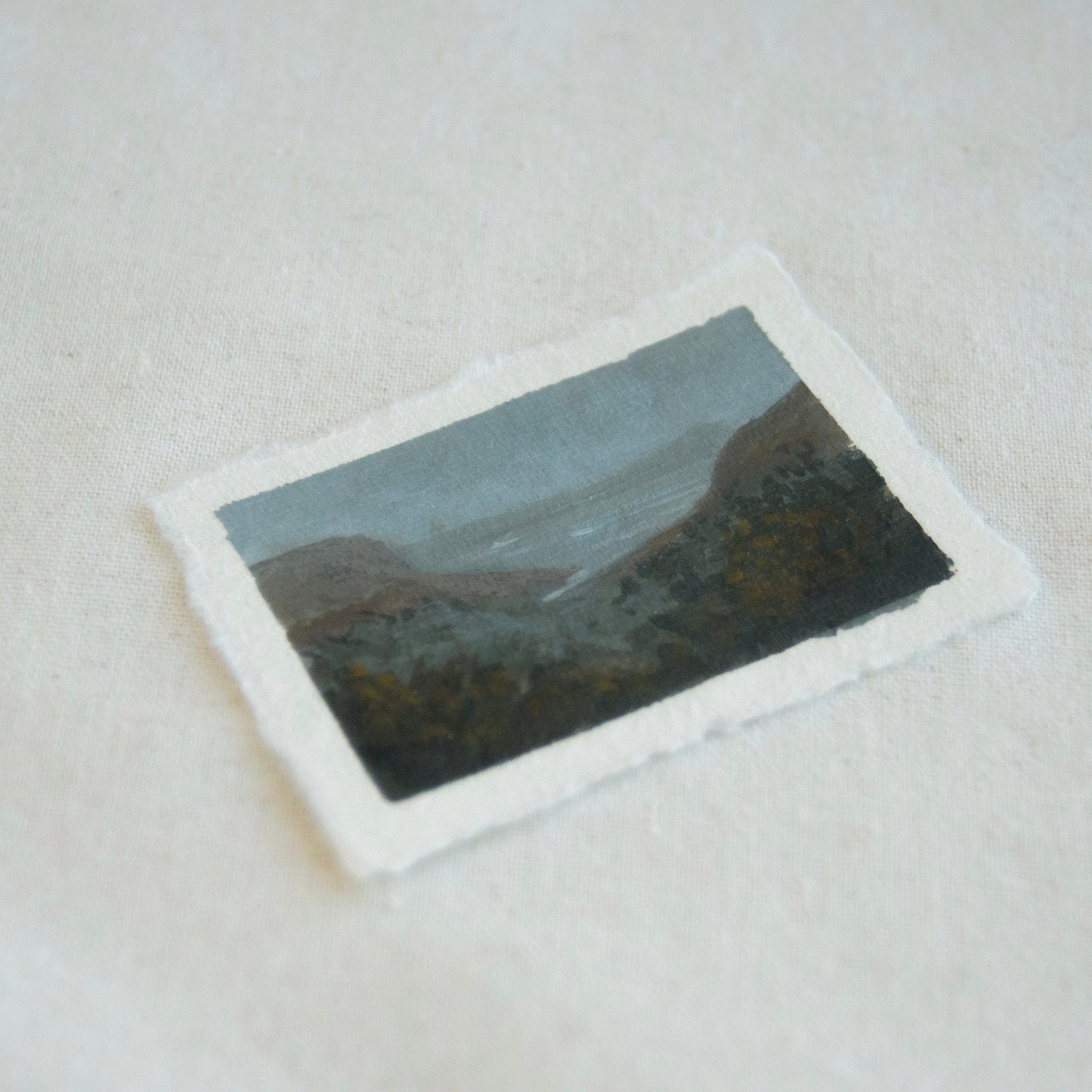side profile of plein a miniature painting with plein air brushstrokes and Point Reyes mountain and ocean scene textures in Point Reyes National Park art