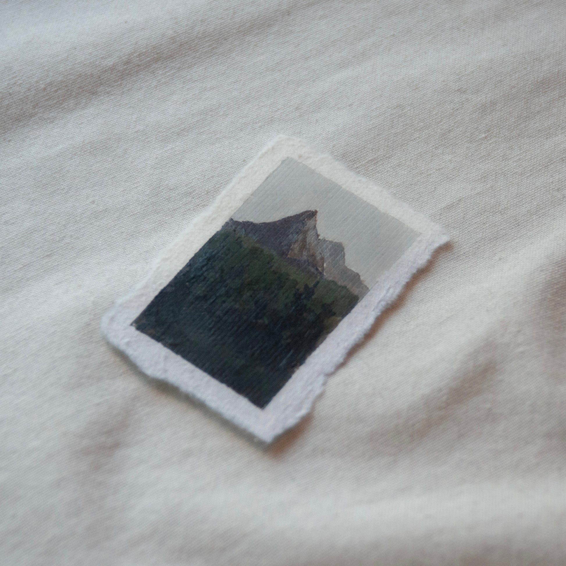 Side profile of pyramid peak view from North Cascades National Park painting on deckled edge 100% cotton rag paper