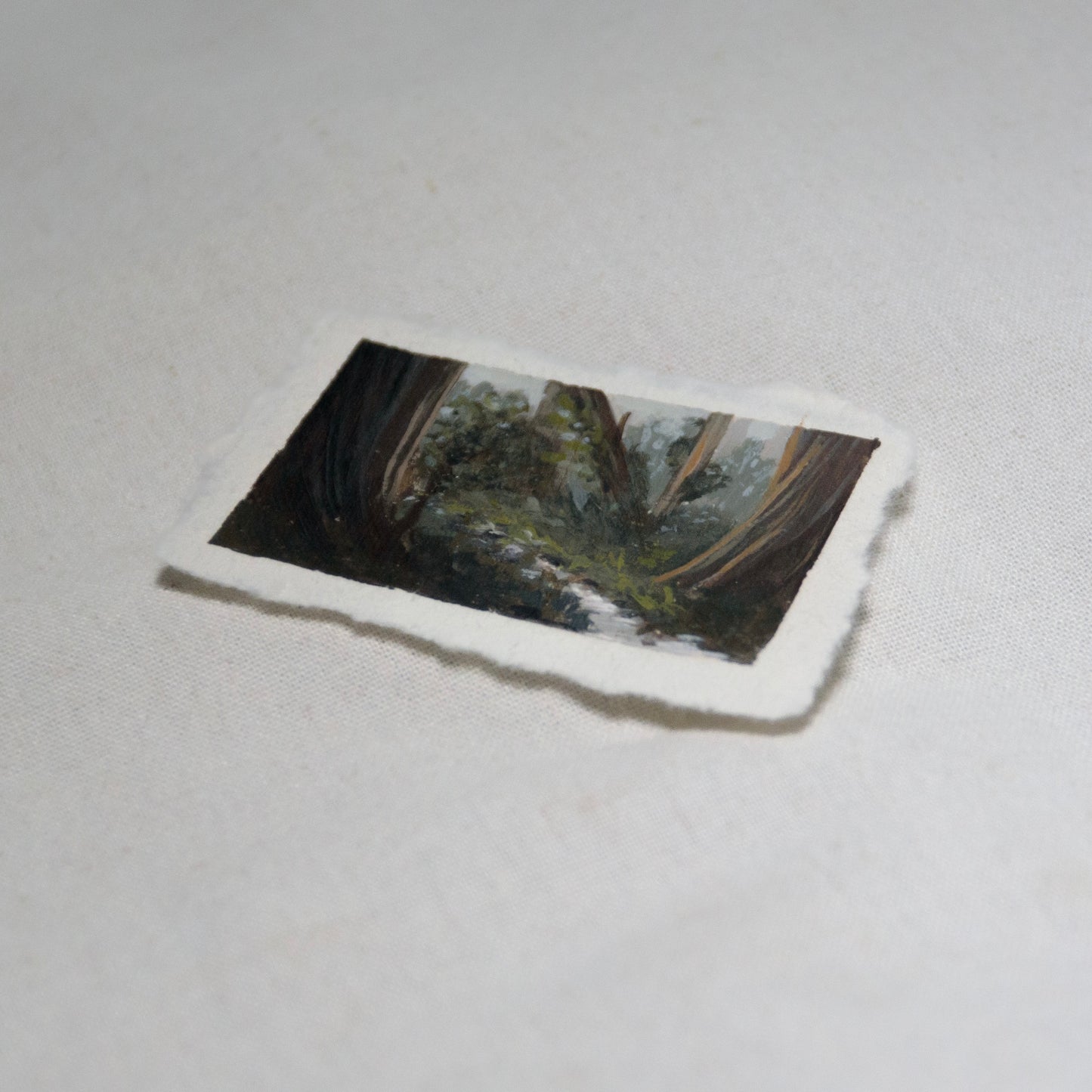 Side profile of redwood creek in redwood national park painting on deckled edge 100% cotton rag paper