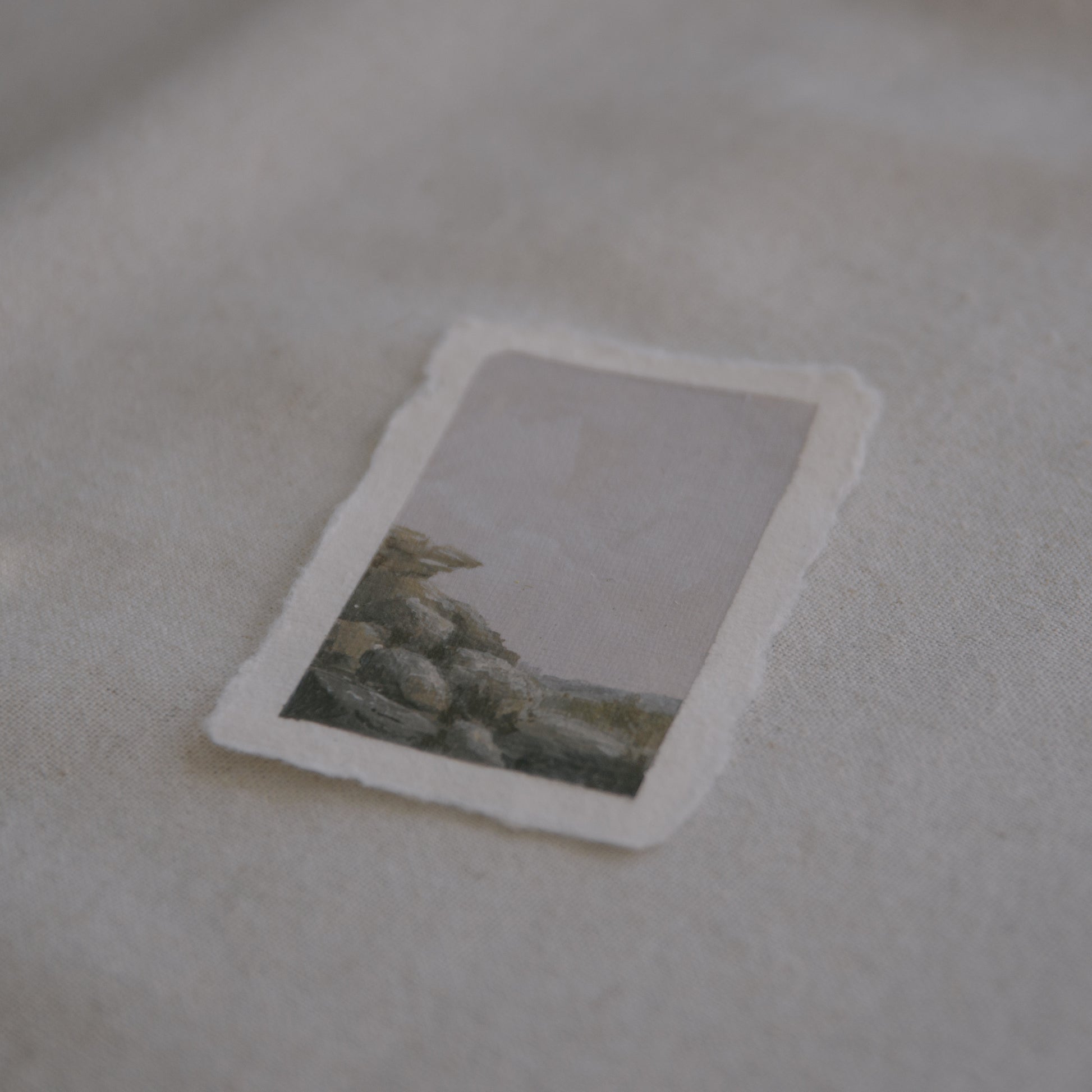 Side profile of granite boulders painting in Joshua Tree National Park on deckled edge 100% cotton rag paper