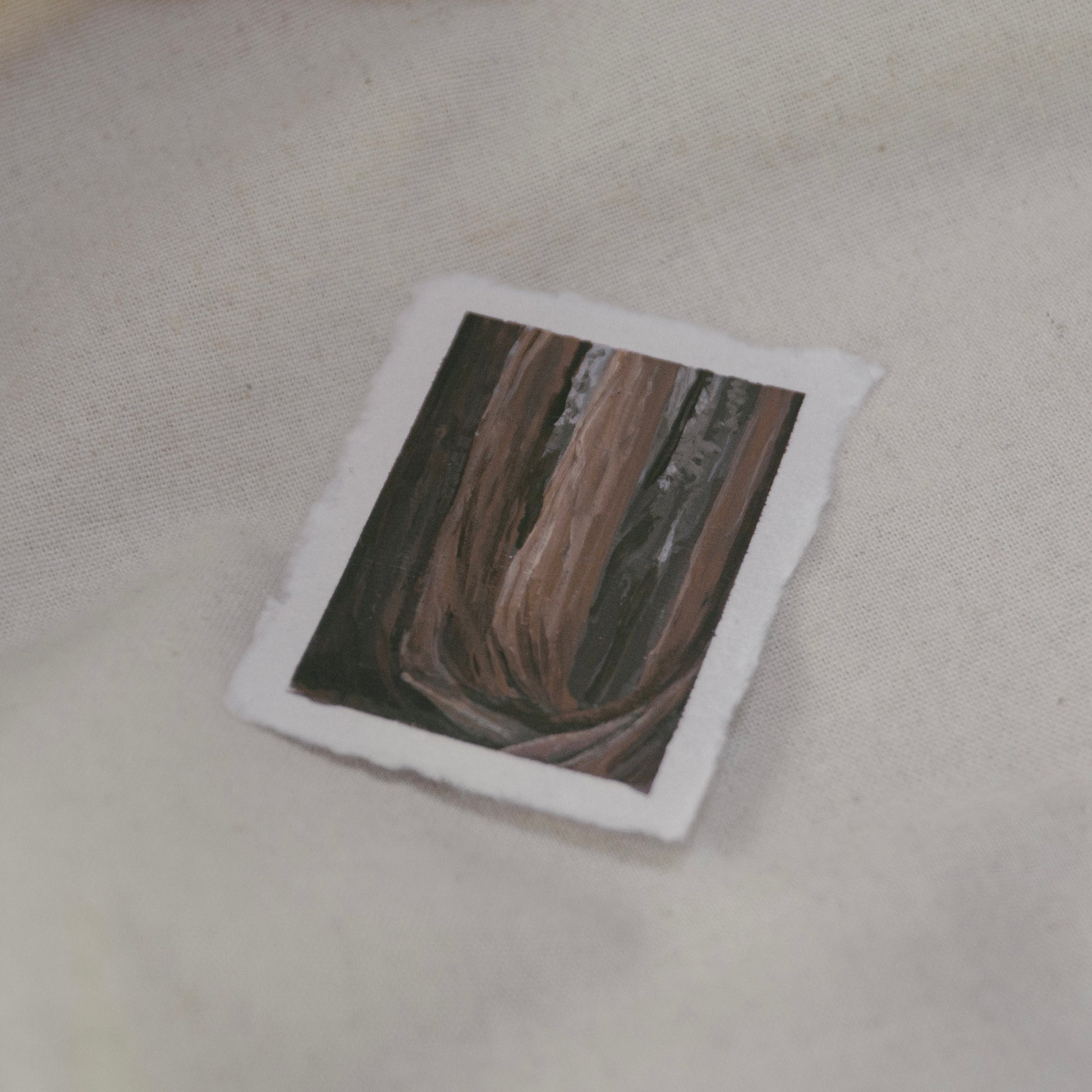 Side profile of a sequoia tree grove in a plein air painting on deckled edge 100% cotton rag paper