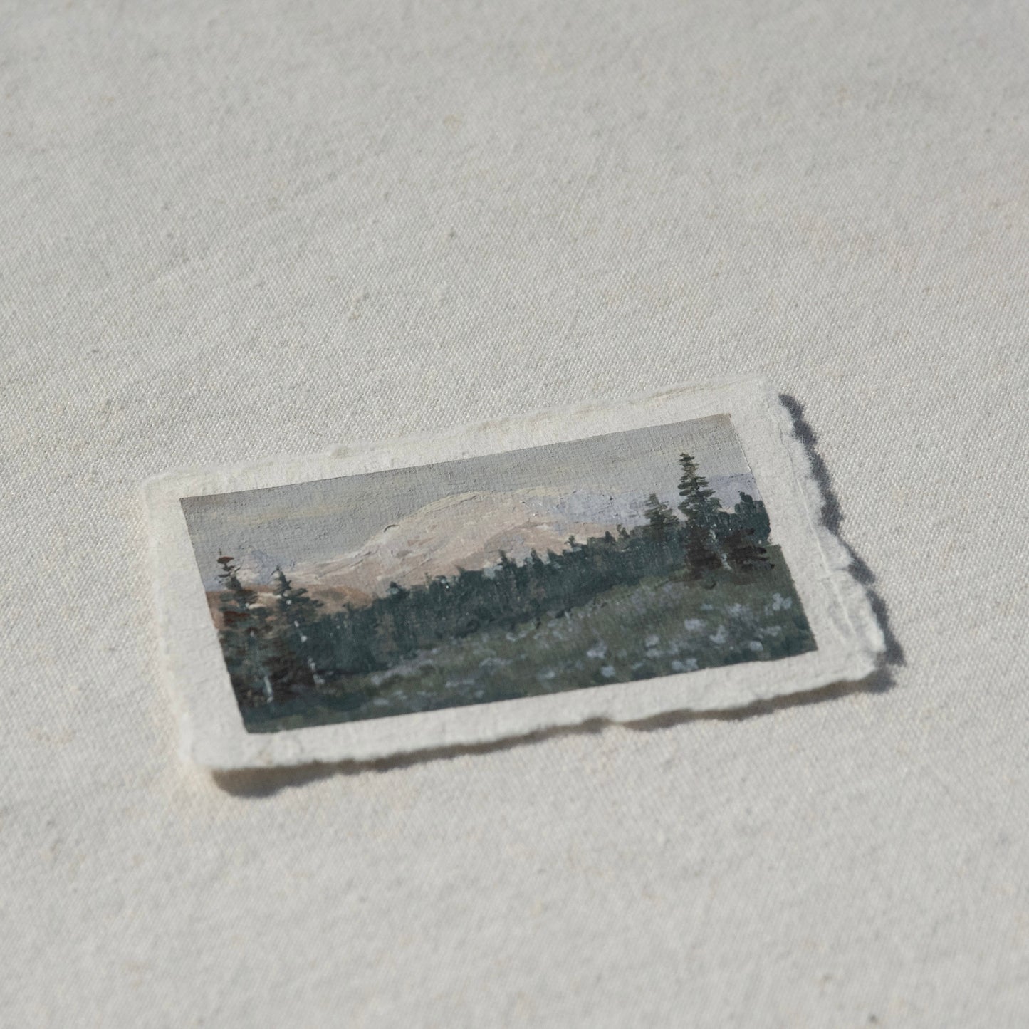 Side profile of silver forest trail in mount rainier national park painting on deckled edge 100% cotton rag paper