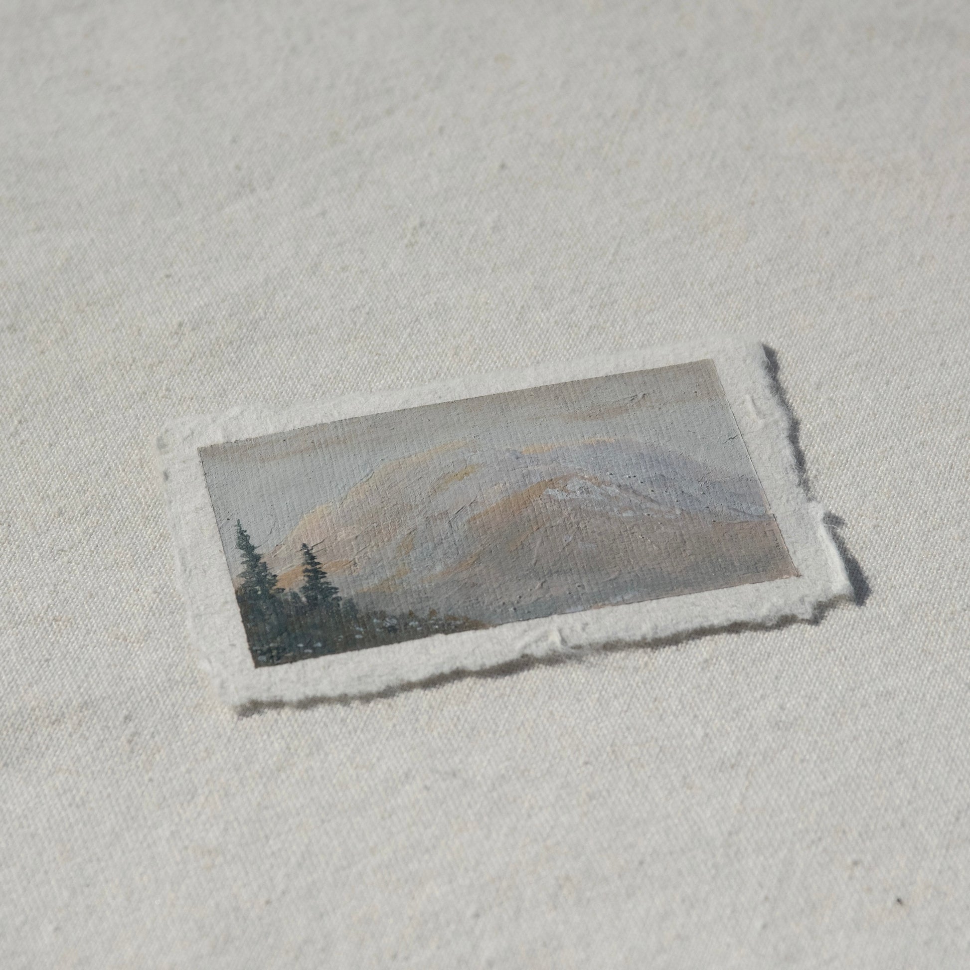 Side profile of mount rainier at sunrise painting on deckled edge 100% cotton rag paper