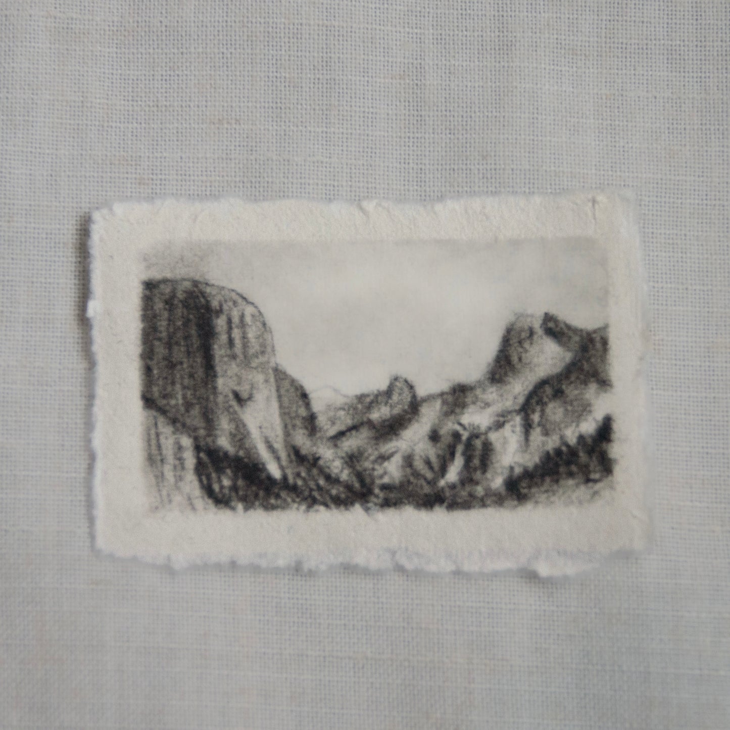A charcoal sketch of Tunnel View in Yosemite National Park on deckled edge paper by Laura Van Moorleghem for 'for the land' collection.