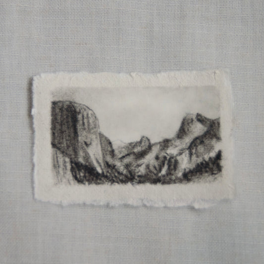 A charcoal sketch of Tunnel View in Yosemite National Park on deckled edge paper by Laura Van Moorleghem for 'for the land' collection.