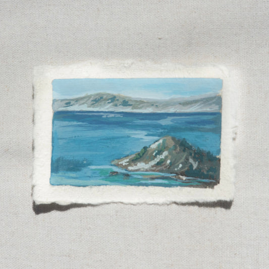 Small gouache painting of crater lake blues with wizard island by Laura Van Moorleghem from Crater Lake National Park